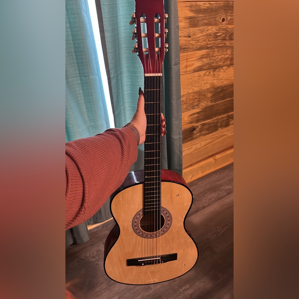 Red and Cream Acoustic Guitar
